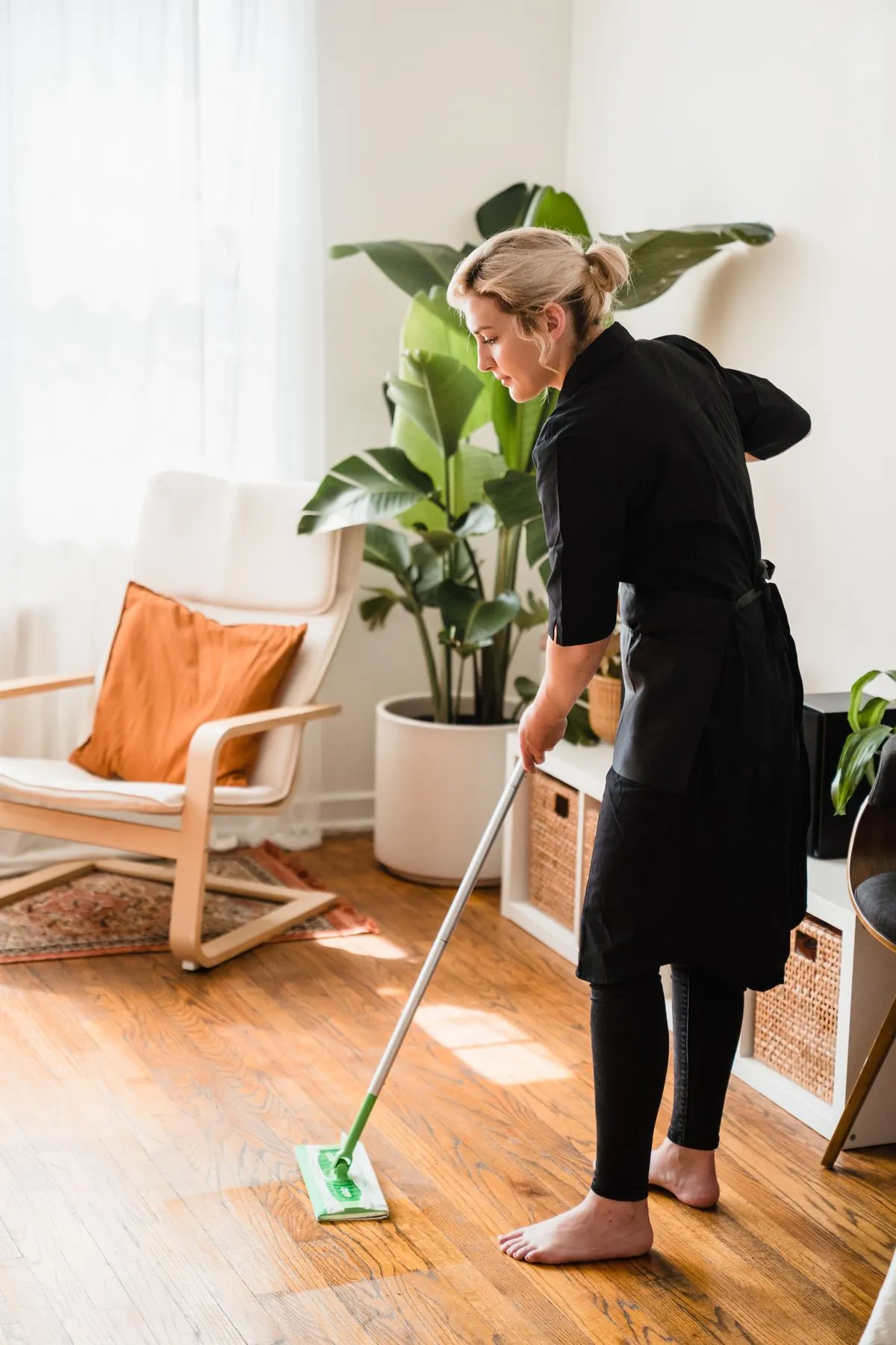 A cleaner caring for an interior floor