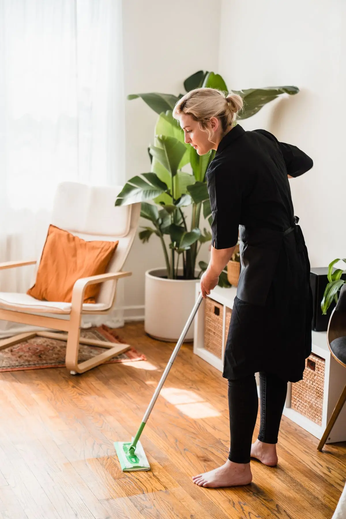 A cleaner caring for an interior floor