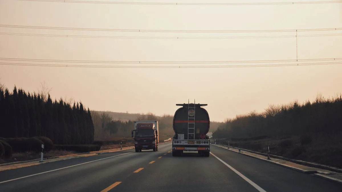 Freight trucks travelling along a highway