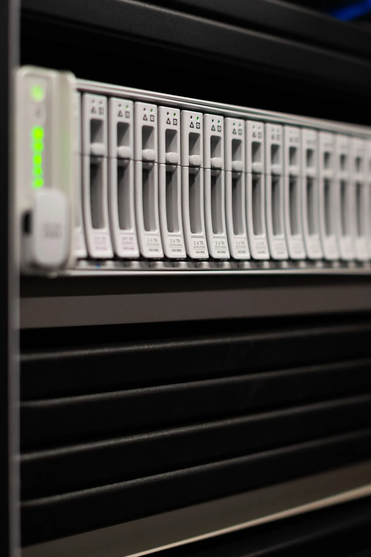 Close-up of data storage hardware inside a server rack