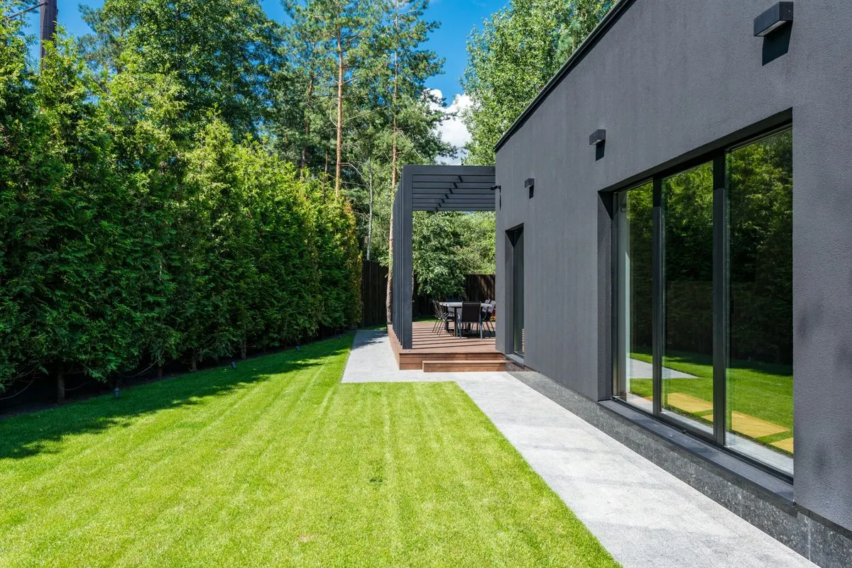 A modern house with landscaped grounds