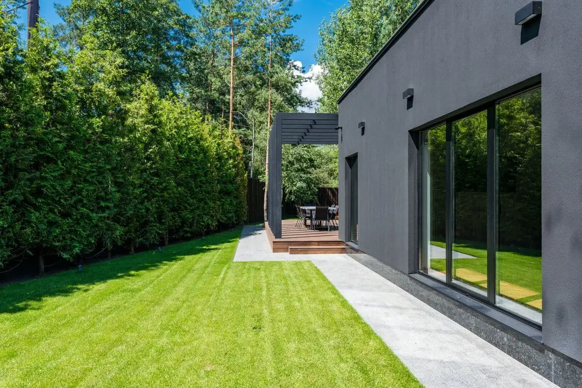 A modern house with landscaped grounds